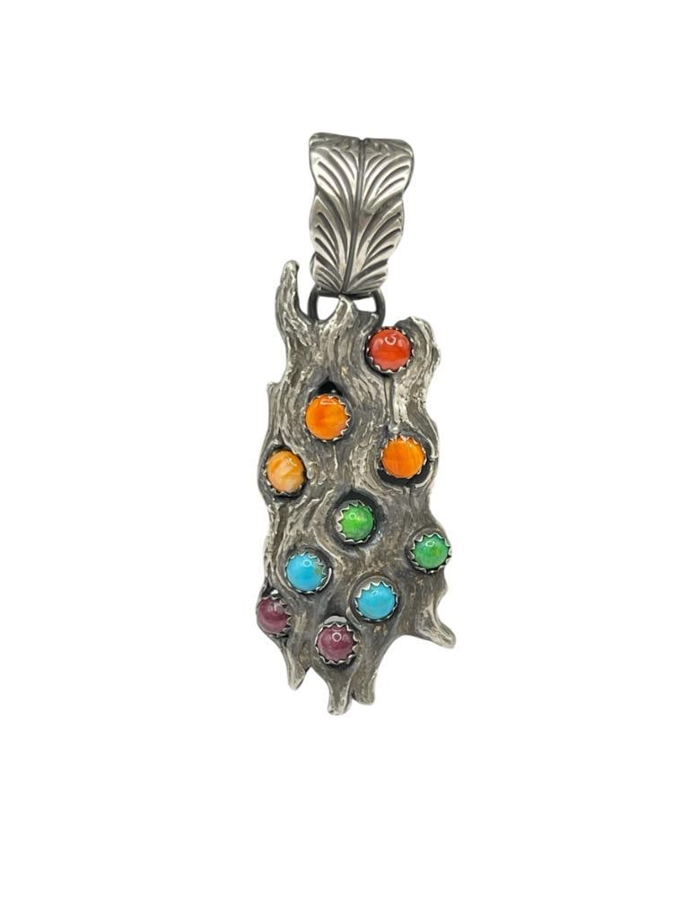STERLING SILVER ARTIST SIGNED B. BEGAY MULTI-GEMSTONE PENDANT: APPEARS TO BE TREE BARK EMBED WITH TURQUOISE, SPINY OYSTER, SUGILITE, CORAL, AND GREEN TURQUOISE 3", 33.81 GRAMS, 5MM GEMSTONES 