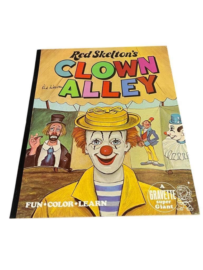 1977 RED SKELTON'S CLOWN ALLEY LARGE FORMAT CHILDRENS COLORING BOOK SIGNED, GRAVETTE PUBLISHING: COLOR ILLUSTRATED COVER, FEATURE 14 COLORING PAGES, ALL ARE BLANK, SIGNED ON THE FRONT COVER 17" X 22" 