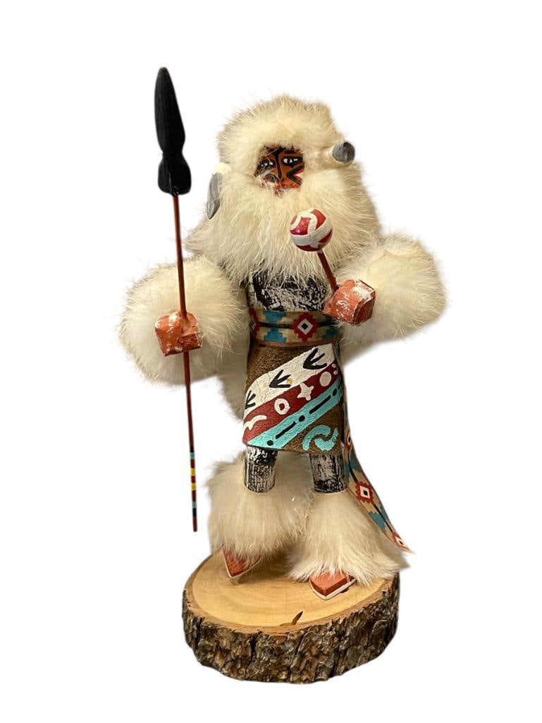 BUFFALO HOPI KACHINA DOLL BY NATIVE AMERICAN ARTIST LITTLE BIRD: HAND CRAFTED KACHINA DOLL MADE FROM COTTON WOOD, ANIMAL, AND FINISHED WITH HAND PAINTED MOTIF, SIGNED ON THE BOTTOM OF WOOD SLAB 10" H 