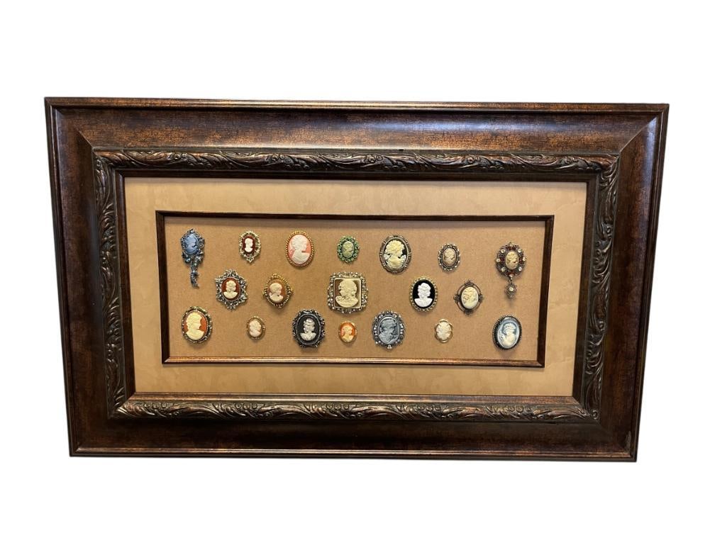 ARTISAN CRAFTED CAMEO DISPLAY MOUNTED BOARD FEATURES 19 VICTORIAN STYLE CAMEOS: SEVERAL CAMEOS ARE BEJEWELED, FRAMED 31" X 19" FRAME, 1 1/4" UP TO 2 3/4" CAMEOS