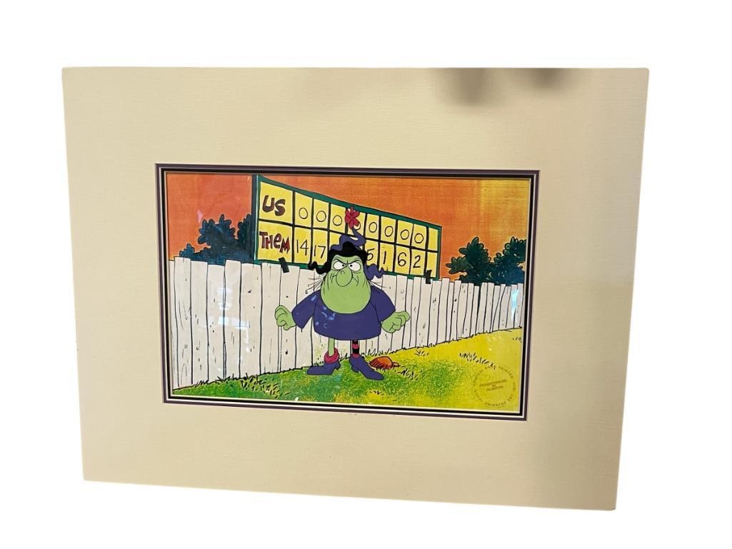 1970'S BROOM HILDA SEGMENT IN FABULOUS FUNNIES SERIES HAND PAINTED ANIMATION CEL BY FILMATION: DEPICTS HILDA ANGRY IN FRONT OF A SCORE BOARD, INCLUDES CERTIFICATE OF AUTHENTICITY, MATTED 18" X 14" 