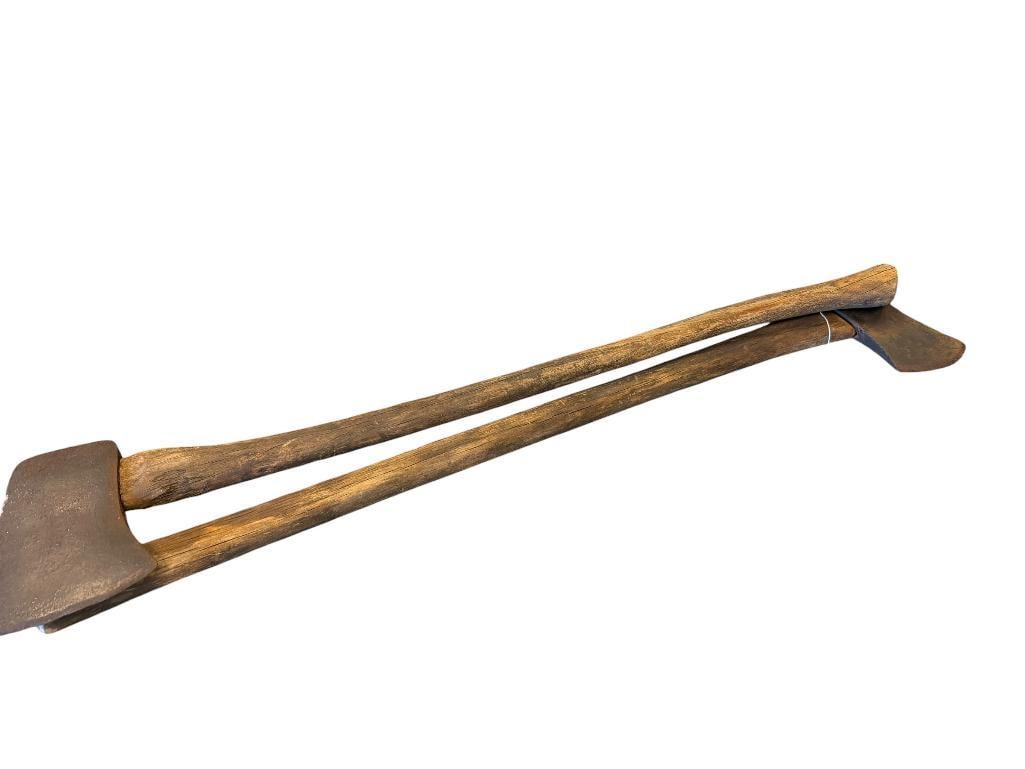 ANTIQUE IRON AXE AND DOUBLE HEAD AXE WITH WOODEN HANDLES: BOTH SHOW AGE AND WEAR FROM USE 7" AND 9 3/4" HEADS, 34" AND 35" L 