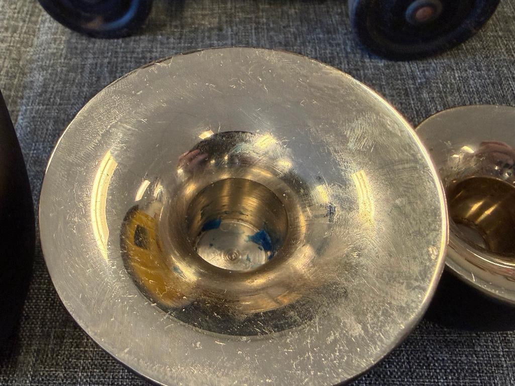 MID-CENTURY MODERN CAST IRON AND CHROME FINISH CANDLESTICK HOLDERS IN GRADUATING SIZES - 12