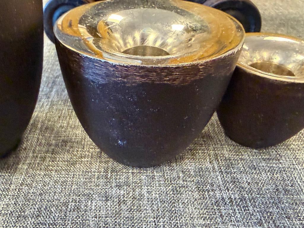 MID-CENTURY MODERN CAST IRON AND CHROME FINISH CANDLESTICK HOLDERS IN GRADUATING SIZES - 13