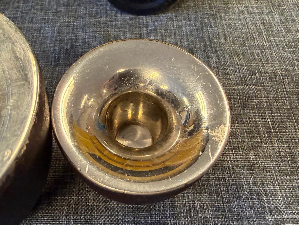 MID-CENTURY MODERN CAST IRON AND CHROME FINISH CANDLESTICK HOLDERS IN GRADUATING SIZES - 16