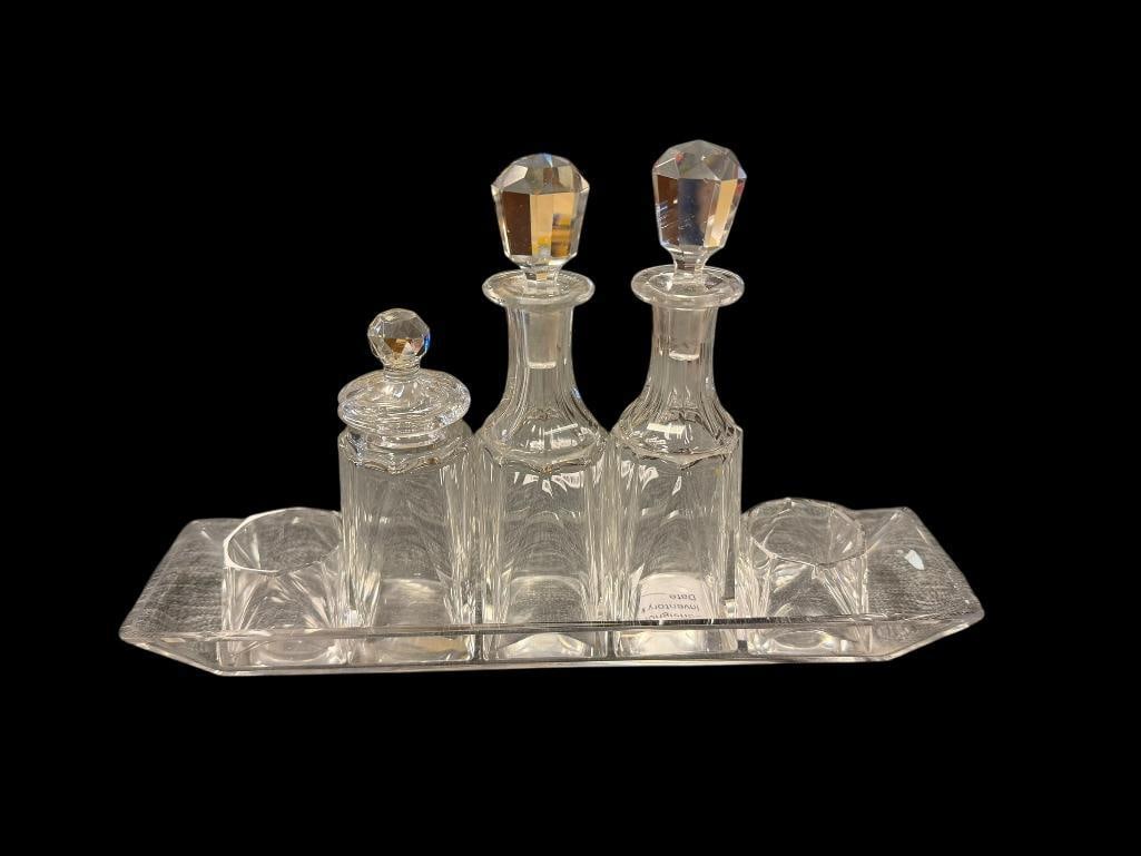 VINTAGE ART DECO GLASS PERFUME CRUET CONDIMENT SET: INCLUDES TWO CRUETS WITH STOPPERS, ONE WITH LID, TWO SMALL GLASSES, AND TRAY, TRAY HAS MINOR CHIP ON CORNER 10 1/2" TRAY, LARGEST IS 6 1/2" WITH STOPPER 