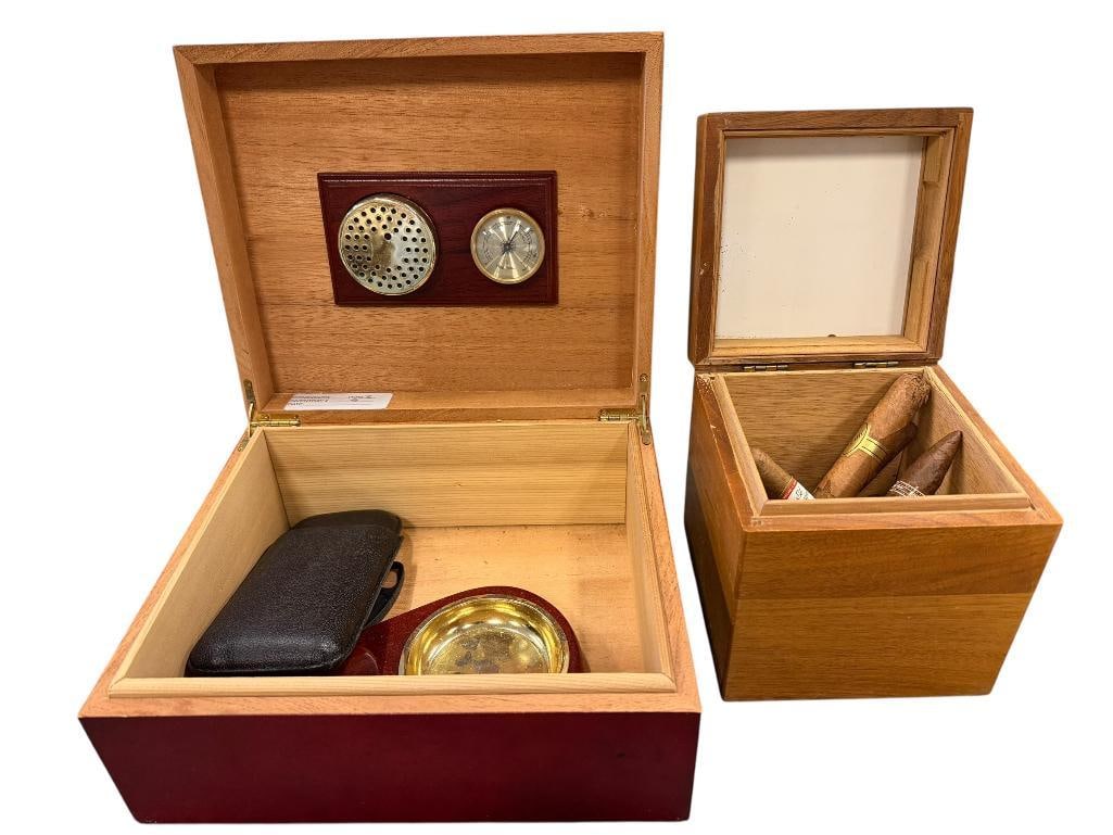 CARLOS CHAVEZ ELEGANT CHERRY STAINED PRESSED WOOD HUMIDOR AND DECATUR INDUSTRIES OAK HUMIDOR: BOTH ARE CEDAR LINED, INCLUDES CIGAR ACCESSORIES SUCH AS CUTTERS AND ASHTRAY, GOOD CONDITION LARGEST IS 10" X 9" X 4 1/2" 