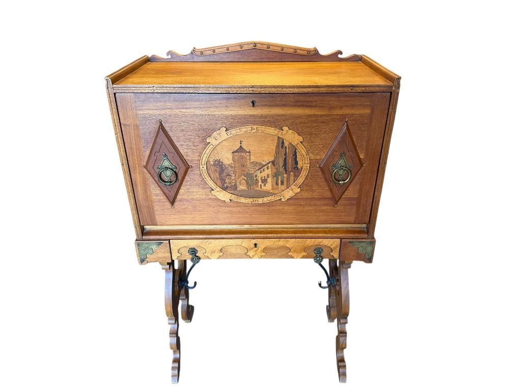 VINTAGE PETERSON ART FURNITURE DAISY LINE SECRETARY DESK FEATURING INLAID MARQUETRY WOOD ART DESIGN: DROP-FRONT WRITING SURFACE, BRASS HARDWARE, GOOD CONDITION, MADE IN FARIBAULT, MINNESOTA BY DANISH EMIGRANT JOHN PETERSON, SOME WEAR TO INTERIOR OF DESK, LABEL "THE DAISY LINE" INSIDE DRAWER, SCROLL