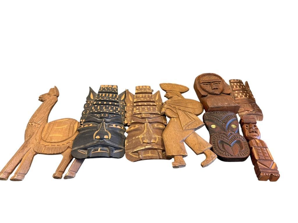 CAERVED WOOD MALAYSIAN STYLE MASKS AND DECOR: SOME WITH OPECA LABEL, ONE MARKED PANAMA, AND ONE MARKED MOKO NZ, MOST ARE IN GOOD CONDITION LARGEST IS 12 1/2" 