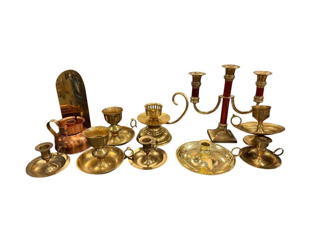 ASSORTED BRASS CANDLESTICKS AND CANDLEHOLDERS: ONE HAS COPPER ACCENT, MOST WITH FINGER LOOP HANDLES, SOME MADE IN INDIA LARGEST IS 9" H 