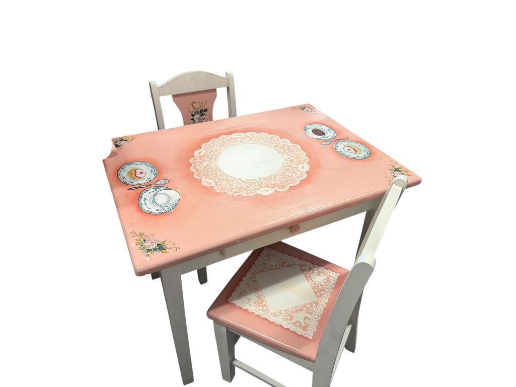 VINTAGE TOLE PAINTED WOOD FANTASY FIELDS PRINCESS AND FROG STYLE CHILD'S PLAY TABLE AND TWO CHAIRS: SIGNED BY ARTIST D. LOVELADY AND DATED '96, PINK AND WHITE WITH FLORAL DESIGNS, FAIR CONDITION 27" X 20' X 20" TABLE 