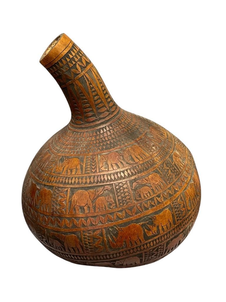 LARGE HAND CARVED AFRICAN CALABASH GOURD MADE IN KENYA: INTRICATELY CARVED ANIMAL AND GEOMETRIC DESIGN WITH RHINOCEROS AND ELEPHANTS 17 1/2" H 