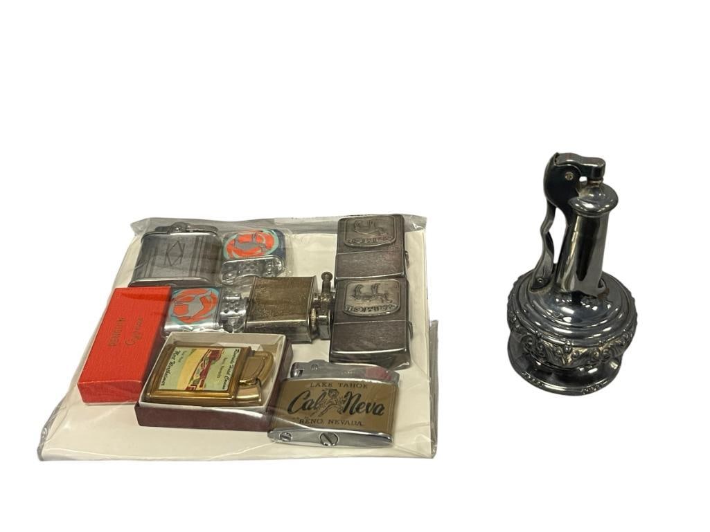 VINTAGE ADVETISEMENT AND TABLE LIGHTERS CAL-NEVA, CAMEL,RIVERSIDE HOTEL, RONSON: INCLUDES FOUR CAMEL LIGHTERS, RONSON DECANTER TABLE LIGHTER, CAL-NEVA LIGHTER, AND RIVERSIDE HOTEL LIGHTER, TEN LIGHTERS TOTAL 