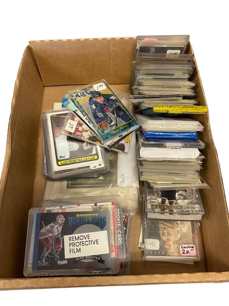 1990'S HOCKEY NHL SPORT PLAYER CARDS INCLUDES THREE SEALED WAX PACKS: MANY CARDS IN PROTECTIVE SLEEVES OR CASES 