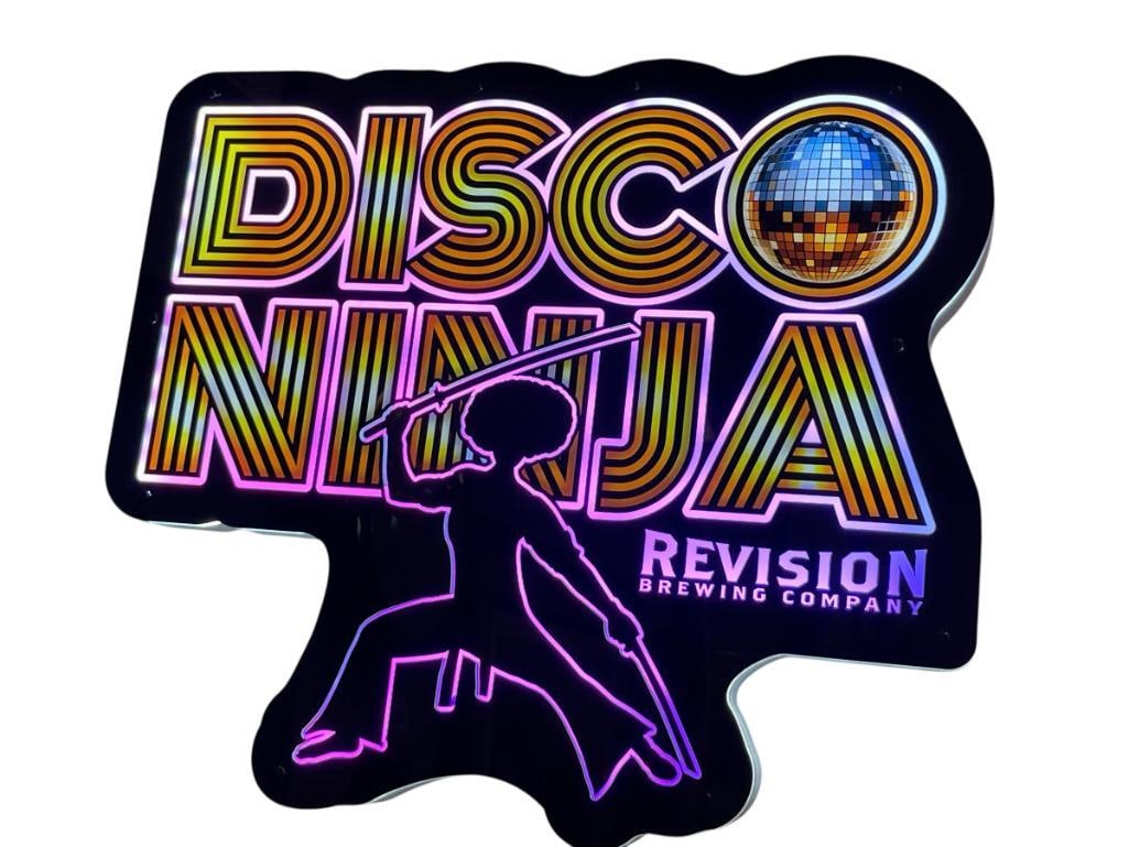 RENO, NV REVISION BREWING CO. DISCO NINJA IPA MULTICOLOR ILLUMINATING SIGN: INCLUDES POWER ADAPTER, LITTLE TO NO WEAR, TESTED + 18" X 15 1/2" 