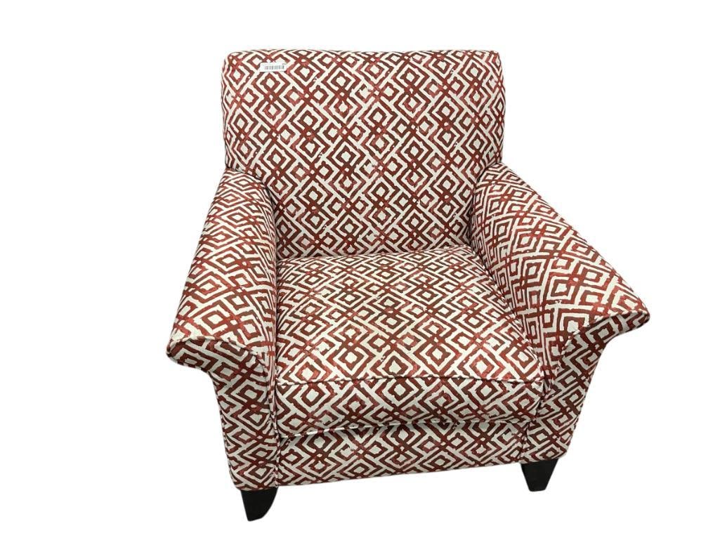 RC WILLEYS RED AND WHITE PATTERN UPHOLSTERED ACCENT CHAIR: TAPERED WOOD LEGS, IN GOOD CONDITION, LITTLE TO NO WEAR 36" X 34" X 36" 