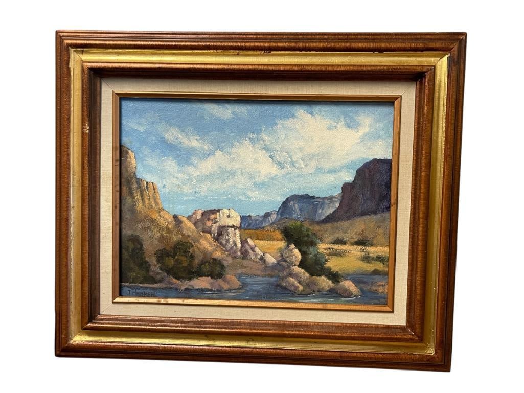 J. HARPER ORIGINAL OIL ON BOARD DESERT LANDSCAPE PAINTING: ART DEPICTS DESERT SCENE WITH MOUNTAIN SCENE WITH RIVER IN FOREGROUND, SIGNED LOWER LEFT, FRAMED 23" X 18" FRAME 
