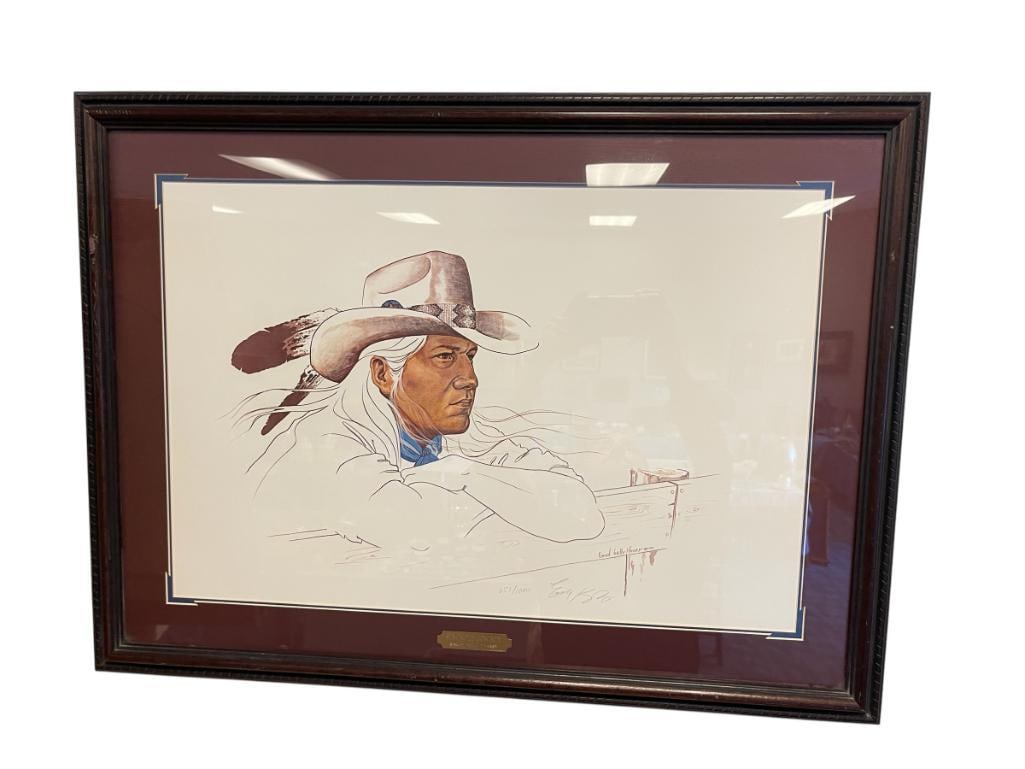 ENOCH KELLY HANEY SEMINOLE / MUSCOGEE OKLAHOMA ARTIST AND POLITICIAN LIMITED EDITION PRINT: ART DEPICTS ILLUSTRATION OF NATIVE AMERICAN MAN IN WESTERN HAT, LEANING OVER A FENCE, TITLED SEMINOLE COWBOY, NO. 651/1000, SIGNED LOWER RIGHT, CERTIFICATE OF AUTHENTICITY ON THE BACK, FRAMED 32" X