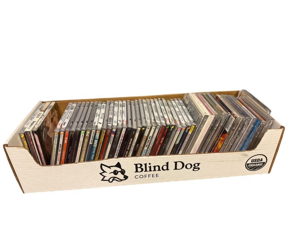 APPROX. 54 ASSORTED SEALED CD'S FEATURING VARIOUS TYPES OF MUSIC INCLUDING BARRY WHITE AND MORE: ALSO INCLUDES DISNEY'S FANTASIA DISC 1 CHARLOTTE CHURCH, SPIN DOCTORS, AND MORE 
