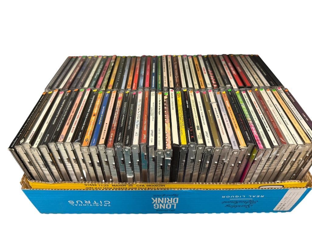APPROX. 75 ASSORTED MUSIC CD'S IN ORIGINAL CASES: INCLUDES VARIOUS GENRES, SEE PHOTOS FOR TITLES 