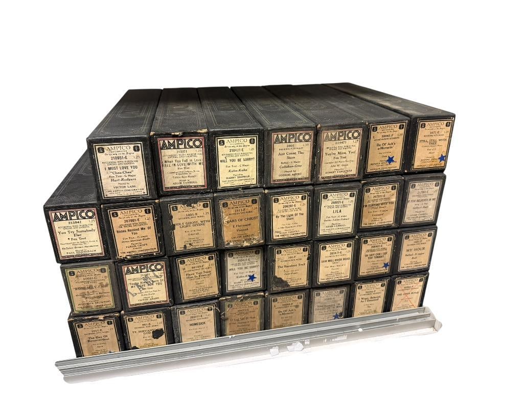 31 ANTIQUE PINAO ROLLS BY AMPICO INCLUDING YOU'RE MINE, YOU! FOX TROT AND YOU TRY SOMEBODY ELSE FOX: SEE PHOTOS FOR TITLES, ALL IN BOXES 