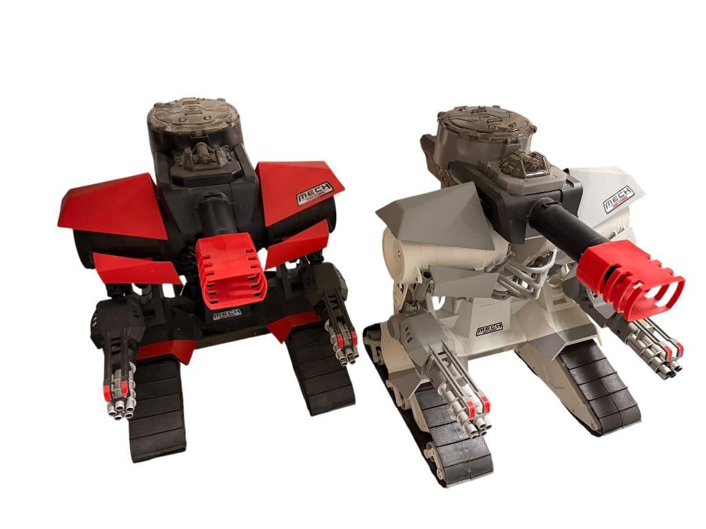 TWO NEW BRIGHT R/C MECH ROBO CANNON REMOTE CONTROLLED ROBOTS: WHICH FIRE FOAM PROJECTILE BALLS, INCLUDES REMOTES AND BATTERY CHARGERS 16" H 
