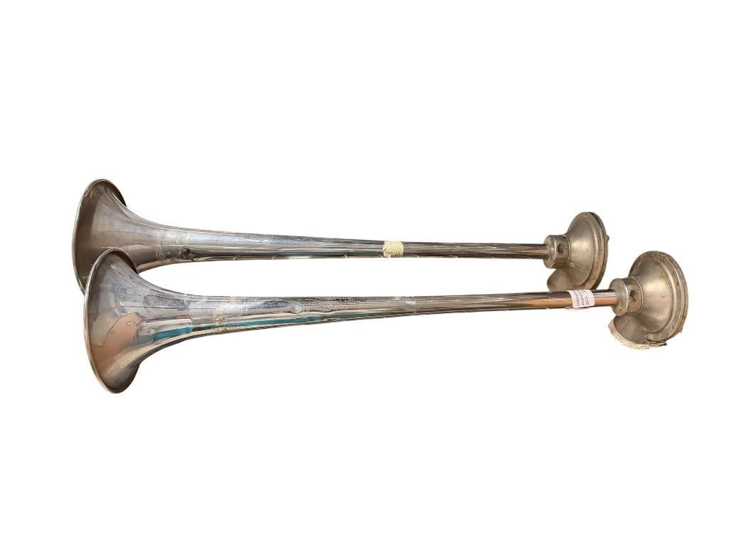 PAIR OF VINTAGE DUAL TRUMPET CHROME TRUCK AIR HORNS: FAIR CONDITION WITH SEVERAL DENTS 24" L 