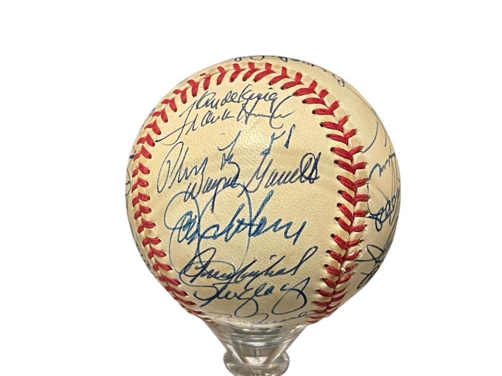AUTOGRAHED BASEBALL WITH OVER 30 SIGNATURES TOM HEINRICH, JOHNNY MIZE, CURT FLOOD, TONY OLIVA: RAWLINGS BASEBALL SIGNED BY OVER 30 PLAYERS IN BLUE INK, ALL LEGIBLE, FROM THE ESTATE OF A LOCAL RENO, NV DOCTOR AT RENOWN WHO RAN BIG LEAGUE SPORTS MEDICINE BASEBALL CAMP FOR NEARLY 20 YEARS, DO