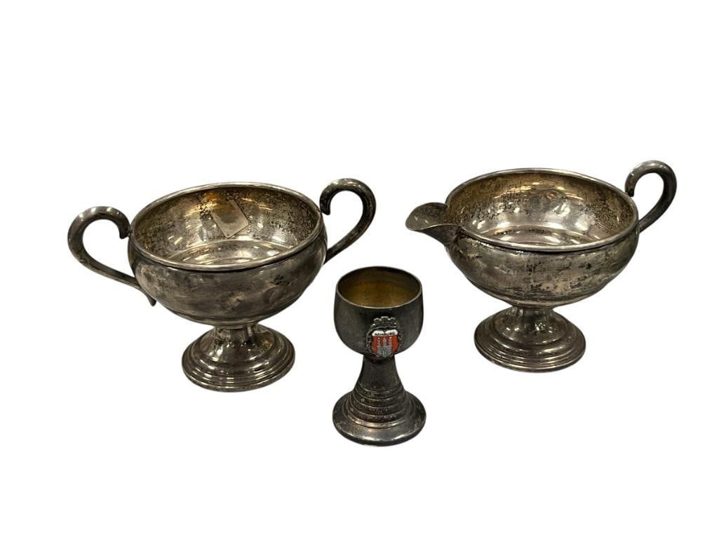 VINTAGE EMPIRE WEIGHTED STERLING SILVER CREAMER AND SUGAR BOWL 155 GRAMS WEIGHTED: NO MONOGRAM, BUT EACH DO HAVE DENTS ON THE BASE AND BODY, 155 GRAMS WEIGHTED, INCLUDES SILVERPLATE HAMBURG CORDIAL 2 3/4" CREAMER AND SUGAR 
