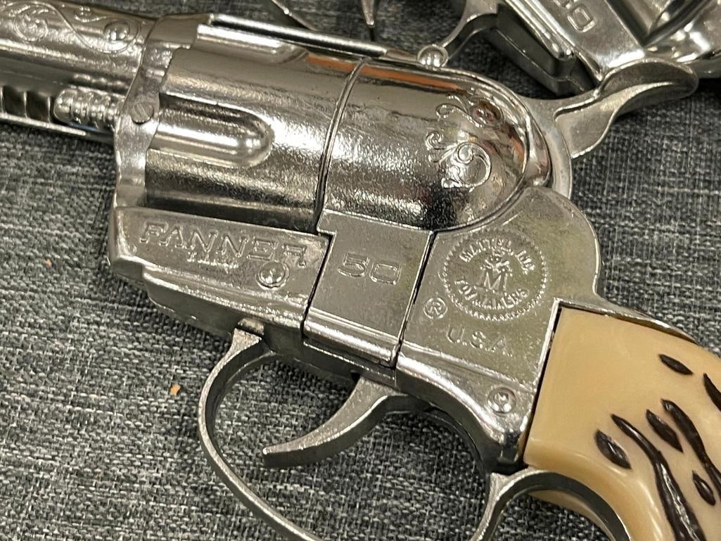 PAIR OF 1950'S - 1960'S MATTEL TOY MAKERS FANNER 50 WESTERN REVOLVER CAP GUNS WITH LARGE STAG GRIPS - 7