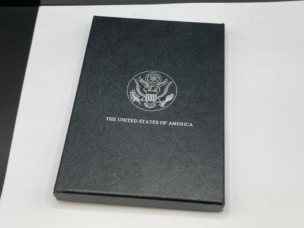 1882-CC UNCIRCULATED U.S. MORGAN SILVER DOLLAR IN GSA HOARD BLACK AND BLUE CASE WITH CERTIFICATE - 10