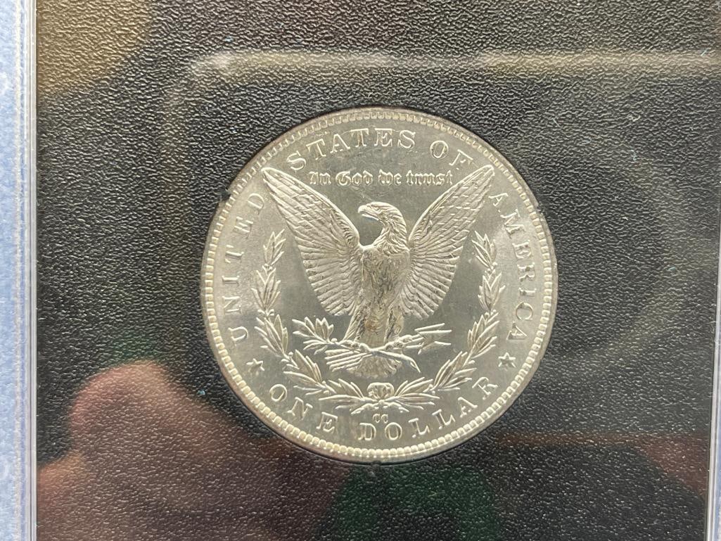 1882-CC UNCIRCULATED U.S. MORGAN SILVER DOLLAR IN GSA HOARD BLACK AND BLUE CASE WITH CERTIFICATE - 6