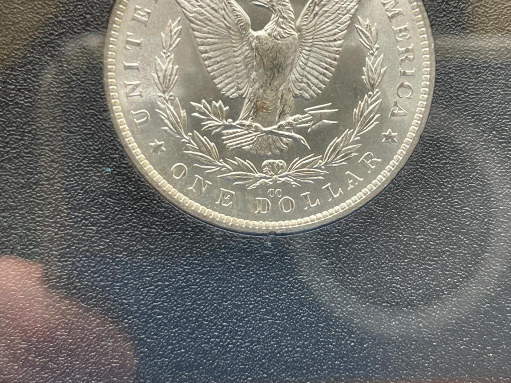 1882-CC UNCIRCULATED U.S. MORGAN SILVER DOLLAR IN GSA HOARD BLACK AND BLUE CASE WITH CERTIFICATE - 8