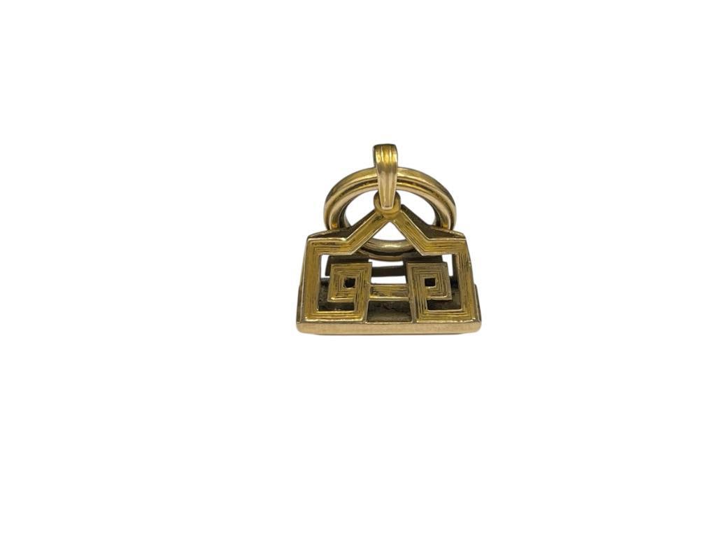 ANTIQUE 10K YELLOW GOLD PIERCED CHARM PENDANT FEATURING GEOMETRIC PIERCED DESIGN: 3/4", 3.64 GRAMS 