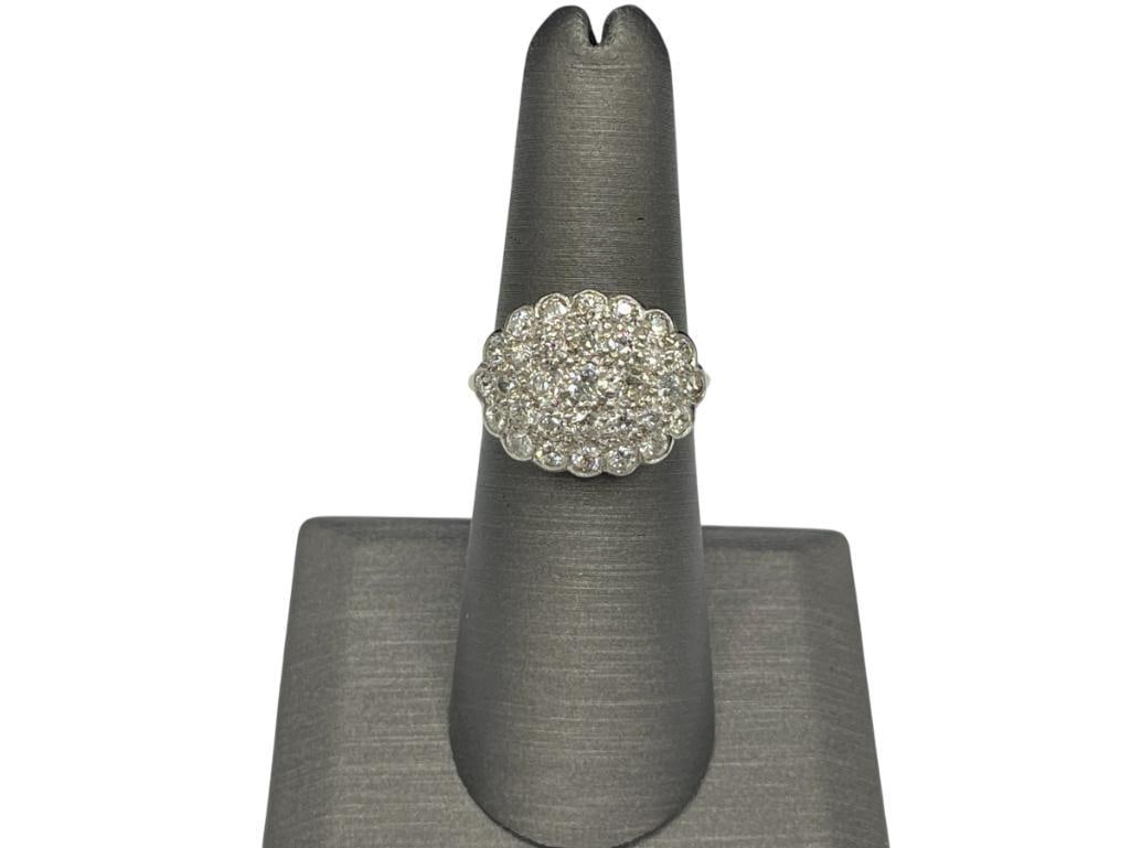 VINTAGE 14K YELLOW GOLD PAVE RING: FEATURING 30 ROUND BRILLIANT CUT DIAMONDS SET IN WHITE GOLD, DIAMONDS RANGE IN SIZE 1.5MM - 2.5MM DIAMONDS, APPROX. 1.00CTTW DIAMONDS, SIZE 6 1/4, 5/8" FRONT, 3.94 GRAMS 