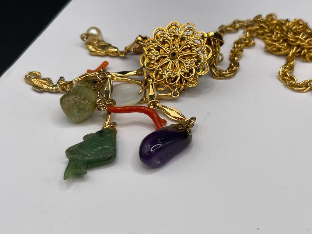 GOLD FILLED NECKLACE FEATURING STONE DANGLES INCLUDING JADE, CORAL, TIGER'S EYE, CORAL, AND MORE - 6