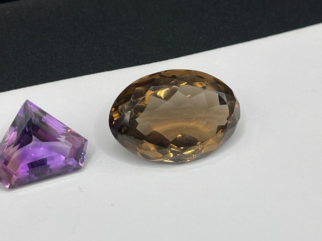 THREE LOOSE GEMSTONES INCLUDING TWO SMOKEY QUARTZ AND AN AMETHYST - 4