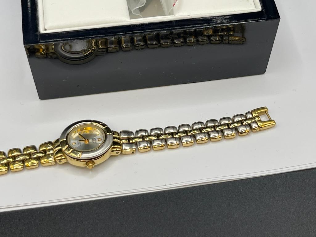 ANNE KLEIN GOLD TONE STAINLESS STEEL DESIGNER LADIES WRISTWATCH WITH ONE DIAMOND DIAL - 8