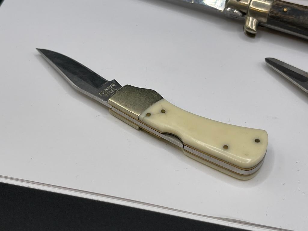 FOLDING KNIVES AND LEATHERMAN UTILITY TOOL - 9