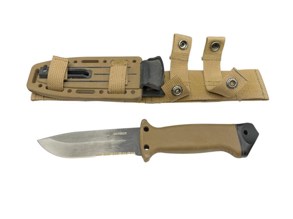 GERBER 0870216F FIXED BLADE TACTICAL KNIFE AND HARD PLASTIC SHEATH: RUBBER HANDLE WITH BLACK STEEL BLACK, BLACK HAS FADED FROM USE, POINTED HANDLE FOR GLASS BREAKING 5" BLADE, 10 1/2" TOTAL LENGTH