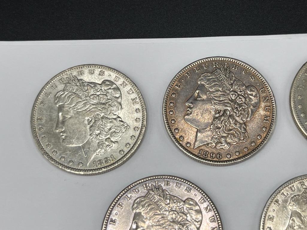 FIVE U.S. MORGAN SILVER DOLLARS FEATURING VARIOUS DATES AND MINT MARKS - 2