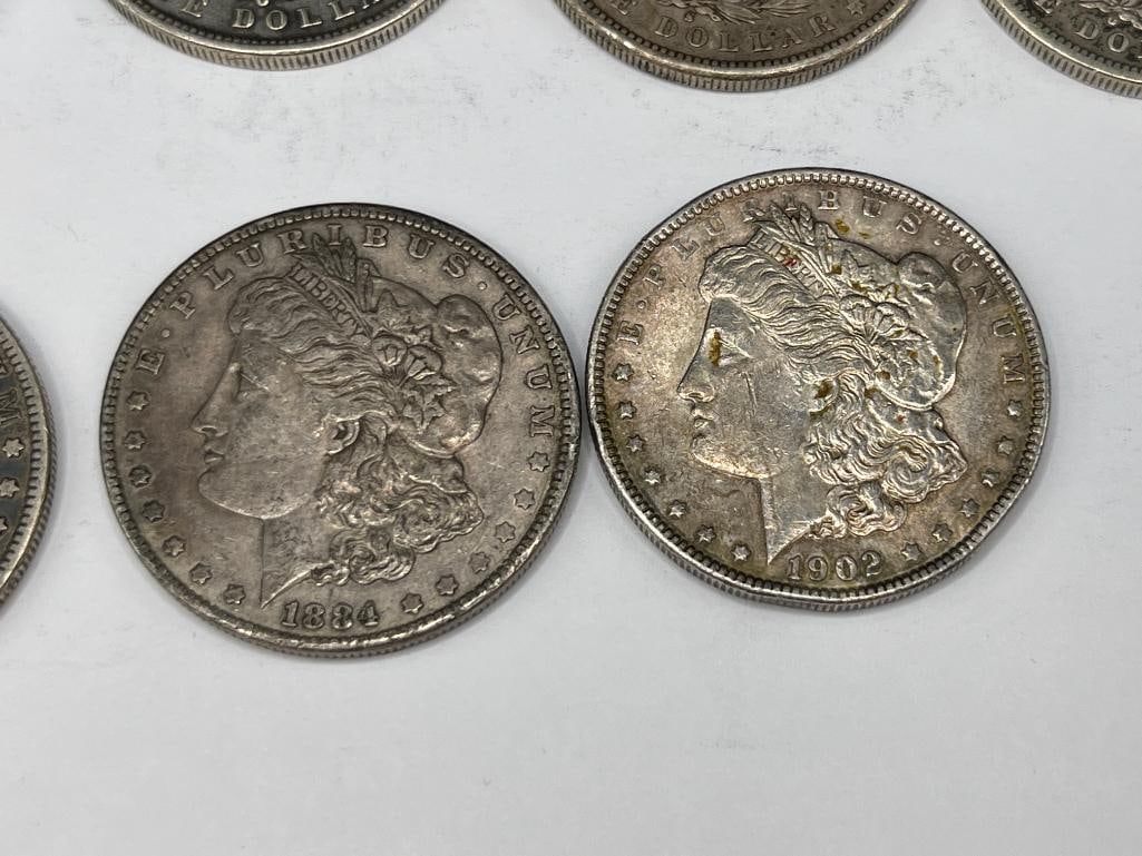 10 U.S. MORGAN SILVER DOLLARS FEATURING VARIOUS DATES AND MINT MARKS - 8