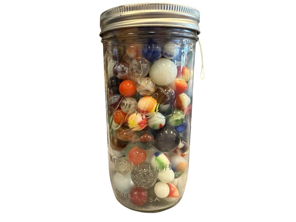BALL MASON JAR FULL OF 20TH CENTURY MARBLES INCLUDING FEW FLUORESCENT MARBLES: JAR WEIGHS APPROX 2 LBS, INCLUDES SEVERAL BOULDERS 6 1/2" JAR