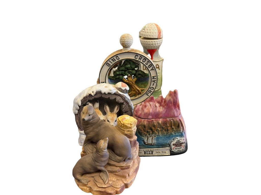 SIX VINTAGE PORCELAIN / CHINA FIGURAL DECANTERS CYRUS NOBLE, REGAL CHINA, W.A. LEGACY: THE GREAT CHICAGO FIRE, BING CROSBY PRO-AM, WGA, BASKETBALL, AND ANIMAL DECANTERS, FEW HAVE CONTENTS 7" UP TO 14 1/2" H