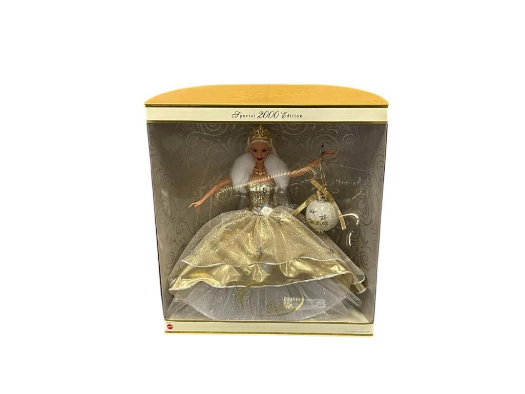 BARBIE HOLIDAY DOLLS BY MATTEL 2000 CELEBRATION, 2000, 2001, 2002 NO. 28269, 50304, 56209, 28269: EACH IS IN ITS ORIGINAL BOX, ALL APPEAR TO HAVE NEVER BEEN TAKEN OUT OF THE BOX, PACKAGES ARE NEAR MINT WITH LIGHT SCUFFS OR SCRATCHES