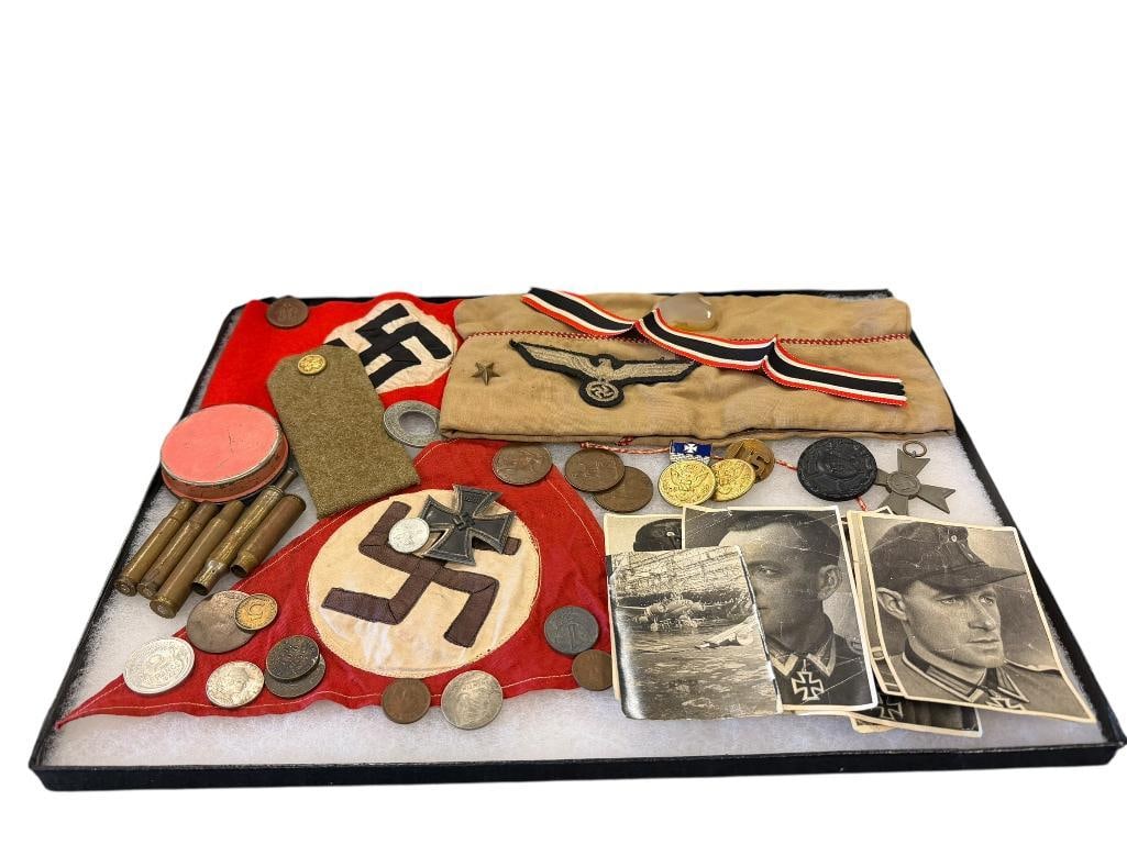 WWII ERA COLLECTIBLES CURRENCY, PHOTOGRAPH, CAP, PATCH, ETC.: BRASS BULLETS, 1930'S AND 1940'S CURRENCY, 1945 NAKASHIMA AIRCRAFT PLANT IN JAPAN PHOTOGRAPH, NAZI EAGLE PATCH, OFFICERS CAP, 1944 JAPANESE PHRASE BOOK FROM WAR DEPARTMENT, ETC. 