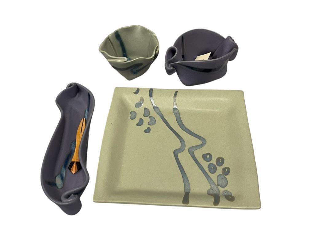 HILBORN CANADIAN POTTERY WHEEL THROWN VESSELS: TWO BOWLS, LONG TRAY AND SQUARE PLATE, EACH PIECE IS SIGNED ON THE BOTTOM, INCLUDES POTTERY NOTE, ONE BOWL INCLUDES SPREADING KNIFE, TRAY INCLUDES WOODEN FORK 4 1/2" AND 5 1/2" BOWLS, 10" PLATE, 10 1/