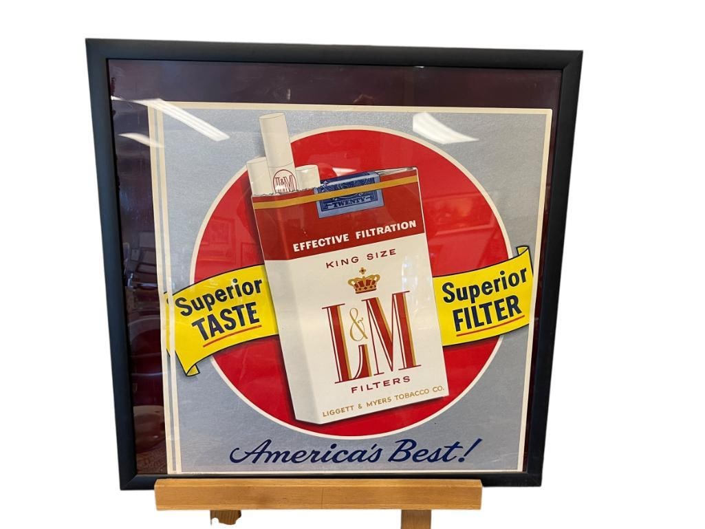 LIGETT & MYERS TOBACCO CO. ADVETISEMENT CIGARETTE POSTERS TOTAL OF TWO CIRCA 1950'S - 1960'S: L & M LIGETT & MYERS TOBACCO CO. CIGARETTE ADVERTISEMENT POSTERS, FRAMED 25 1/2" X 25 1/2" 