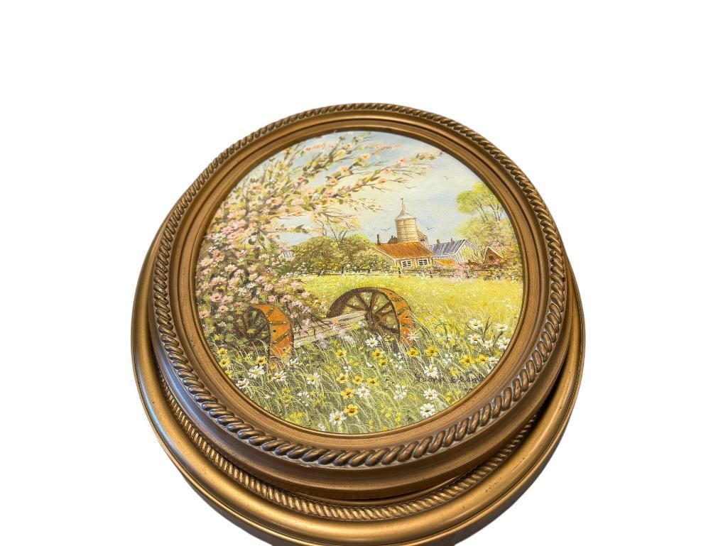 TWO ORIGINAL OIL ON CANVAS PAINTINGS BY LEONA BLANK INCLUDING " CHERRY BLOSSOMS ": OTHER PAINTING FEATURES A SWAN IN A POND DURING FALL, BOTH IN OVAL FRAMES AND SIGNED BY ARTIST, CIRCA EARLY 1990'S LARGEST FRAME IS 13" X 18" 