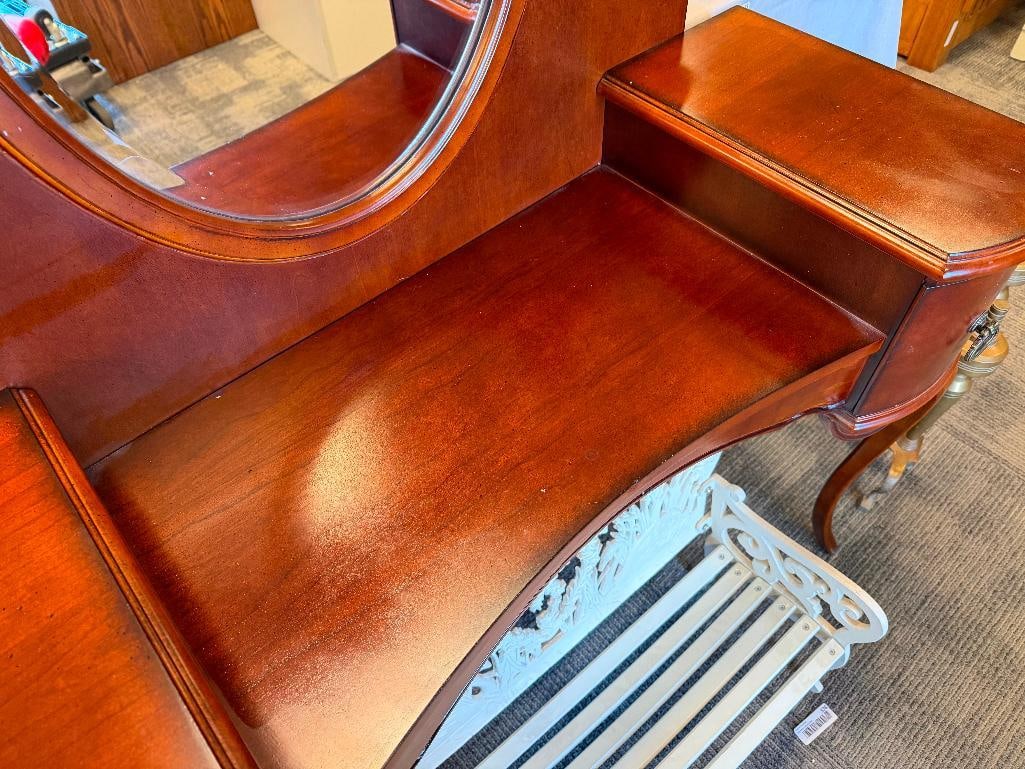 ELEGANT CHERRY STAINED WOOD CHILD'S VANITY BY BUTLER FURNITURE WITH OVAL BEVELED GLASS MIRROR - 3